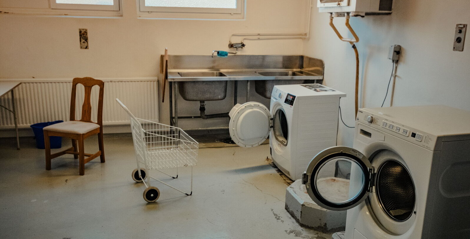 Bild på tvättstugan på Ågatan 44 före renoveringen.